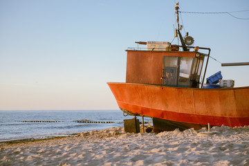 fisherman boats at sunrise time on the beach