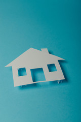 Fototapeta na wymiar House shaped paper cutout