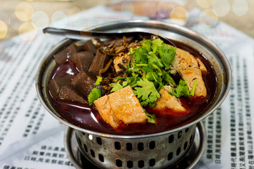 Braised tofu in pot.