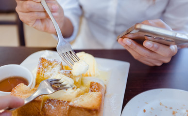 Asian woman are eating ice ream and delicious