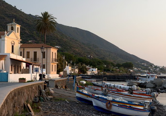 Fishing boats on the rocky beach in Lingua, Salina, The Aeolian Islands, off Sicily, Messina Province, Mediterranean