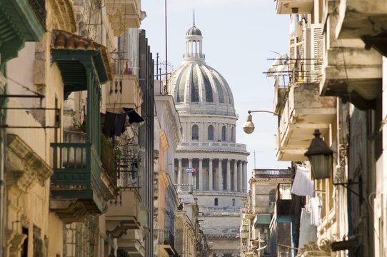 A view of the Capitolio seen through the streets of Habana Vieja (old town), Havana, Cuba