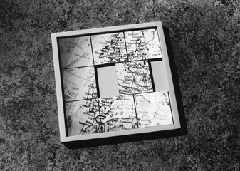 Slide-puzzle with jumbled map (b&w)