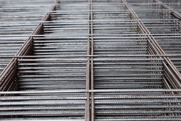 Obraz premium metal rods stacked in piles