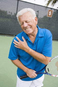 Senior man injures right shoulder while playing tennis