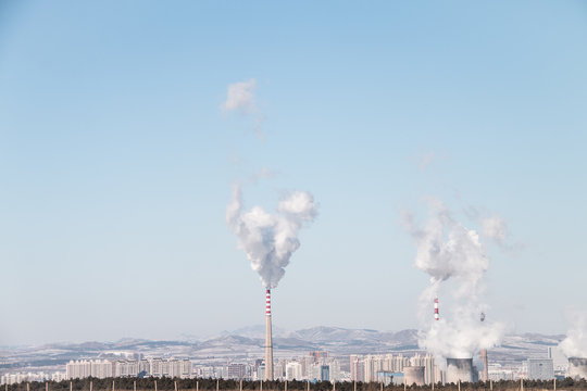 The chimneys in winter cities pollute the environment