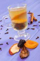 Fresh compote of dried fruits, ingredients and spices on boards