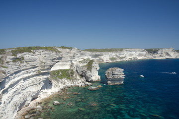 White limestone cliffs above emerald sea in Bonifacio, Corsica, France, Mediterranean