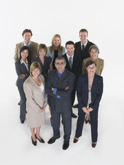 Full length group portrait of multiethnic businesspeople against white background
