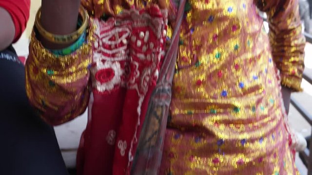 Young Girls dressed as Hindu goddess with make-up and traditional clothing at the Pushkar Mela festival in Rajasthan, India 