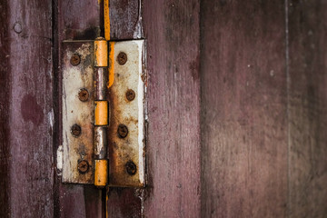 A rust hinge at the old wooden door. Protect Anti-theft Protecti