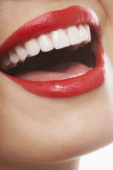 Closeup of laughing woman with red lips