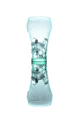 Ice cubes in glass with reflection