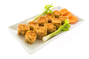 Deep fried crab meat roll in white plate