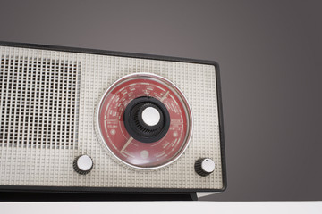 Closeup of retro radio isolated over colored background