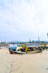 Abandoned boat at boat jetty