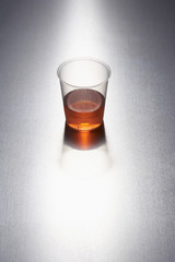 Medication in plastic cup