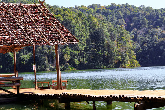 Bamboo bridge and hut in lake and camping site