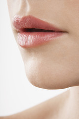 Detailed image of woman with perfect lips on white background