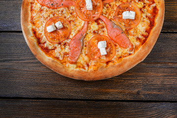 Pizza with cheese and fish