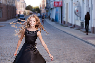 Smiling girl in the street