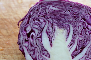 Closed up purple cabbage fresh vegetable for good health on the wood block 