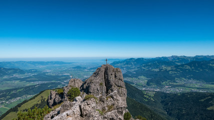 Fototapeta na wymiar Crucifix on mountain peak