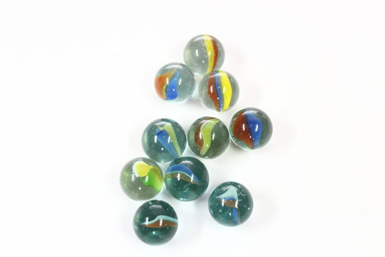 assorted marbles are ready to be played by children in Indonesia