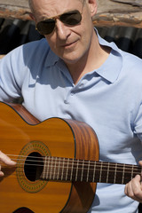 Obraz premium Man with guitar
