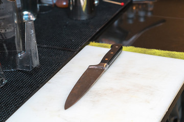 Knife on cutting board
