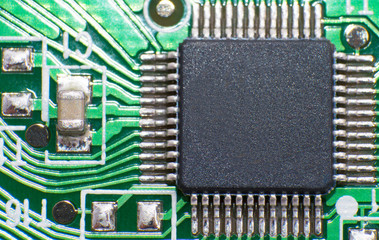 Electronic circuit board close up with chips processor