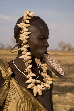Portrait of a Mursi woman with clay lip plate, Mursi Hills, Mago National Park, Lower Omo Valley, Ethiopia