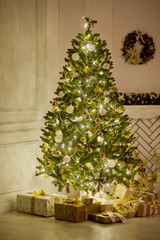 Elegant Christmas tree decorated with glistening glass balls and fairy lights.