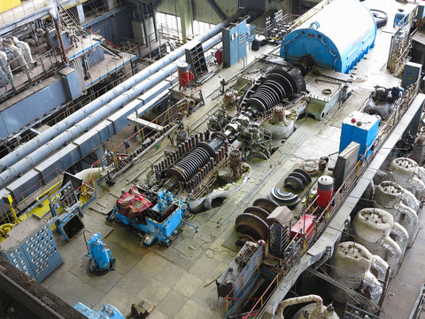 steam turbine in repair process, machinery, pipes, tubes, at pow