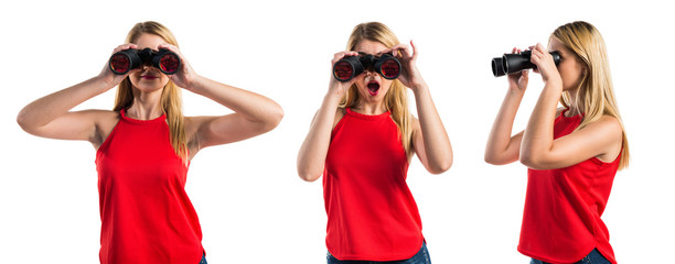Blonde girl with binoculars