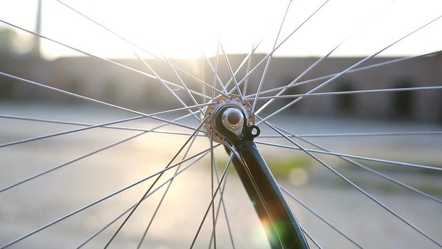 Rotating bicycle wheel