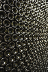 Full frame shot of bottles in wine cellar