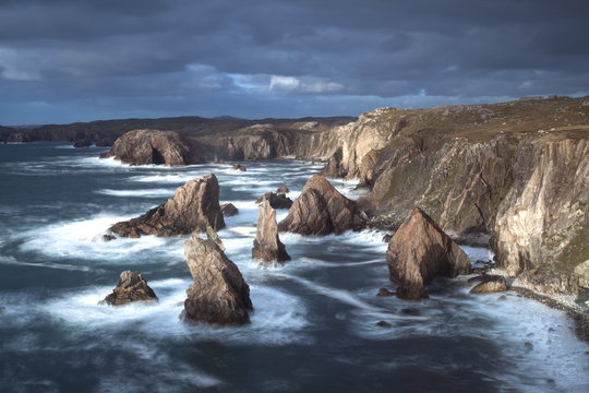 Rugged coastline being pounded by waves on the West coast of Lewis at Mangersta, Isle of Lewis, Outer Hebrides, Scotland 