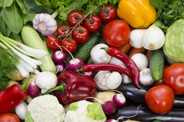Background of fresh vegetables and greens closeup
