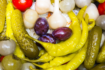 Pickled vegetables, cucumber tomatoes asparagus and garlic cabbage