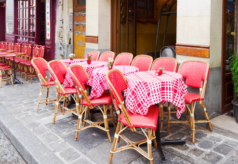 view of romantic Monmartre street with cafe, Paris, France