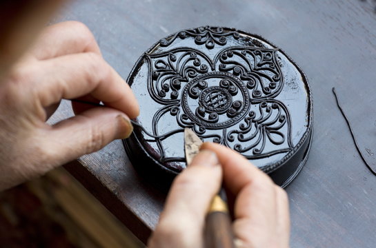 Black Kengtung style lacquerware being made at U Mu Ling Ta, a fifth-generation shop specialising in lacquerware in Kengtung (Kyaingtong), Shan State