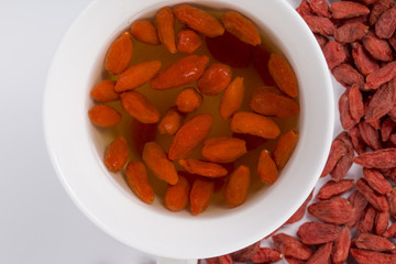 Chinese wolfberry  (Goji)  tea and wolfberry on the white background