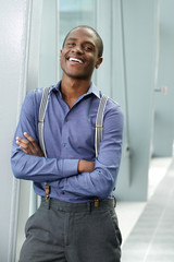 cool young black businessman smiling