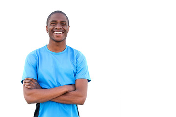 happy african guy smiling with arms crossed on isolated white background