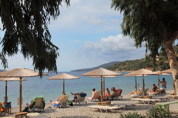 Sraw umbrellas on the beach of Agios Dimitrios,Alonissos,Greece