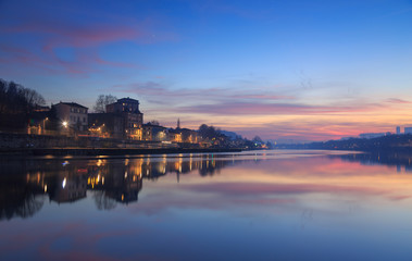 Fototapeta na wymiar Colorful dawn at the Saone river in the city of Lyon.