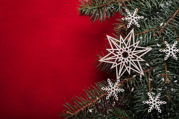 Christmas background with xmas tree and sparkle bokeh lights on wooden canvas background. Merry christmas card. Winter holiday theme. Happy New Year. Space for text. Happy Holidays