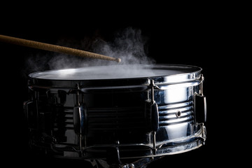 Drum sticks hit on the snare drum