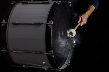 Drum sticks hit on the bass drum - obrazy, fototapety, plakaty